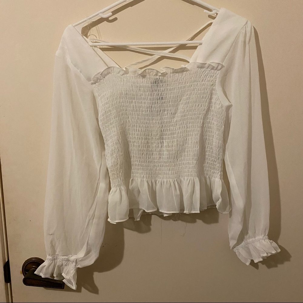 White long sleeve top